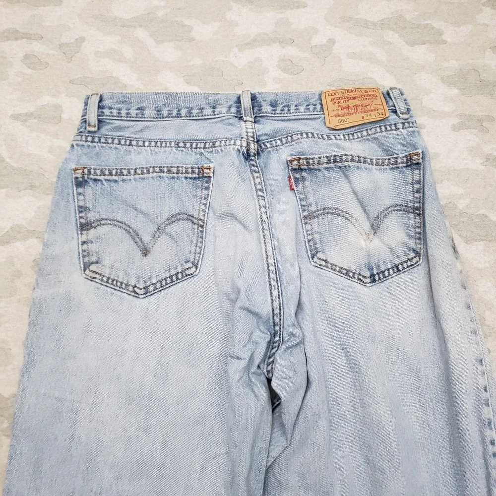 VTG Levi's 560 Jeans Mens 34x34 Blue Y2K Comfort Fit Denim Light Wash Distressed